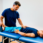 **

"A physical therapy session with a young patient who has broken their arm after a motorcycle accident doing exercises at home. Fully clothed, appropriate attire, safe for work, perfect anatomy, natural proportions, professional photography, high quality. Family-friendly, modest."

**